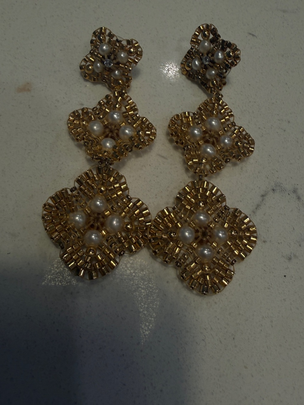 Miguel Ases White and Gold Hanging Earrings